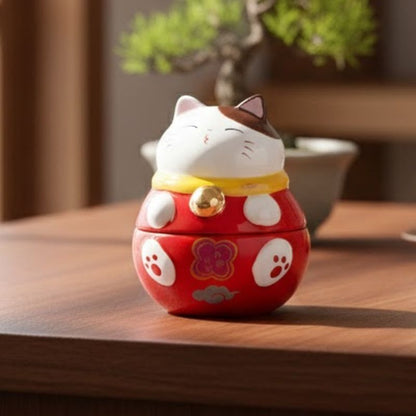 Daruma Chat Attendrissant